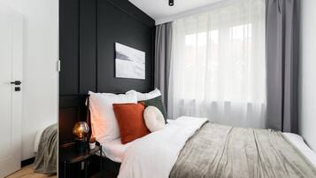 Superior Apartment, City View | 2 bedrooms, in-room safe, individually decorated, individually furnished
