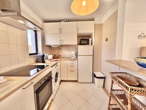 Microwave, coffee/tea maker, cookware/dishes/utensils