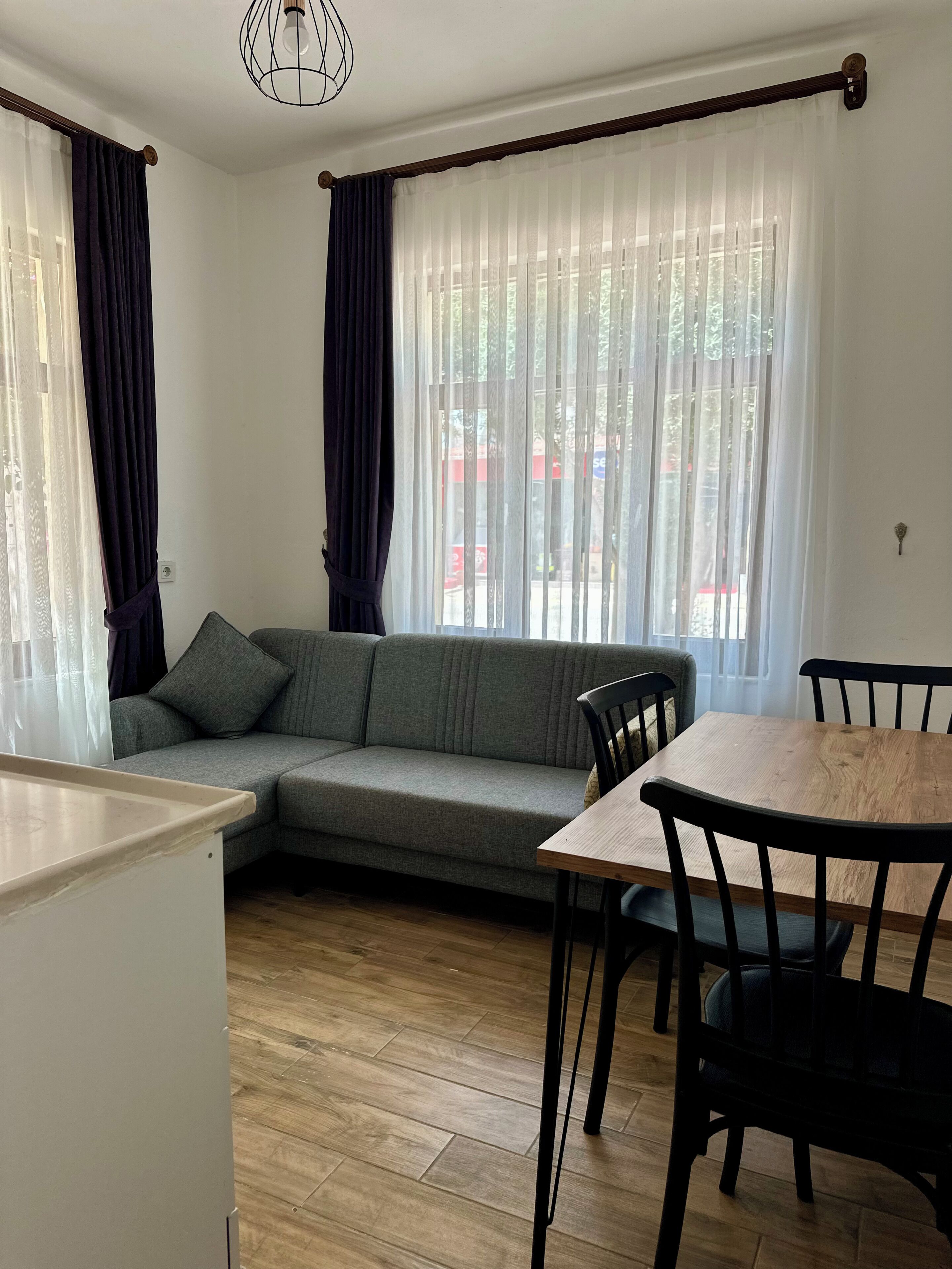 Appartement Deluxe, 1 lit double et 1 canapé-lit, balcon, vue ville | Coin séjour