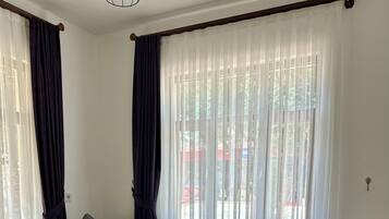 Appartement Deluxe, 1 lit double et 1 canapé-lit, balcon, vue ville | Coin séjour