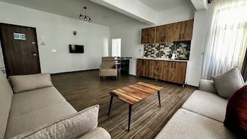Comfort-Apartment, Balkon, Gartenblick | Wohnbereich