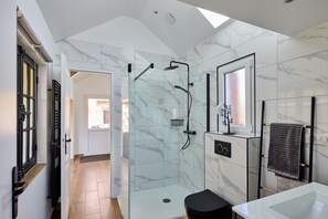 Shower, hair dryer, towels, soap