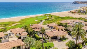 A coastal resort with beachfront villas, a golf course, and a view of the ocean. - Luxury Cabo Del Sol Oceanfront Villa w/ Infinity Pool, Walk to Beach & Golf View (Corridor)