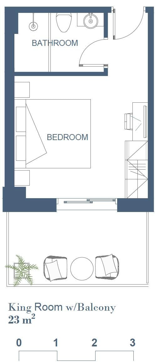 Ein Grundriss eines Hotelzimmers mit Balkon, beschriftet als 'King Room w/Balcony', mit einer Größe von 23 m².