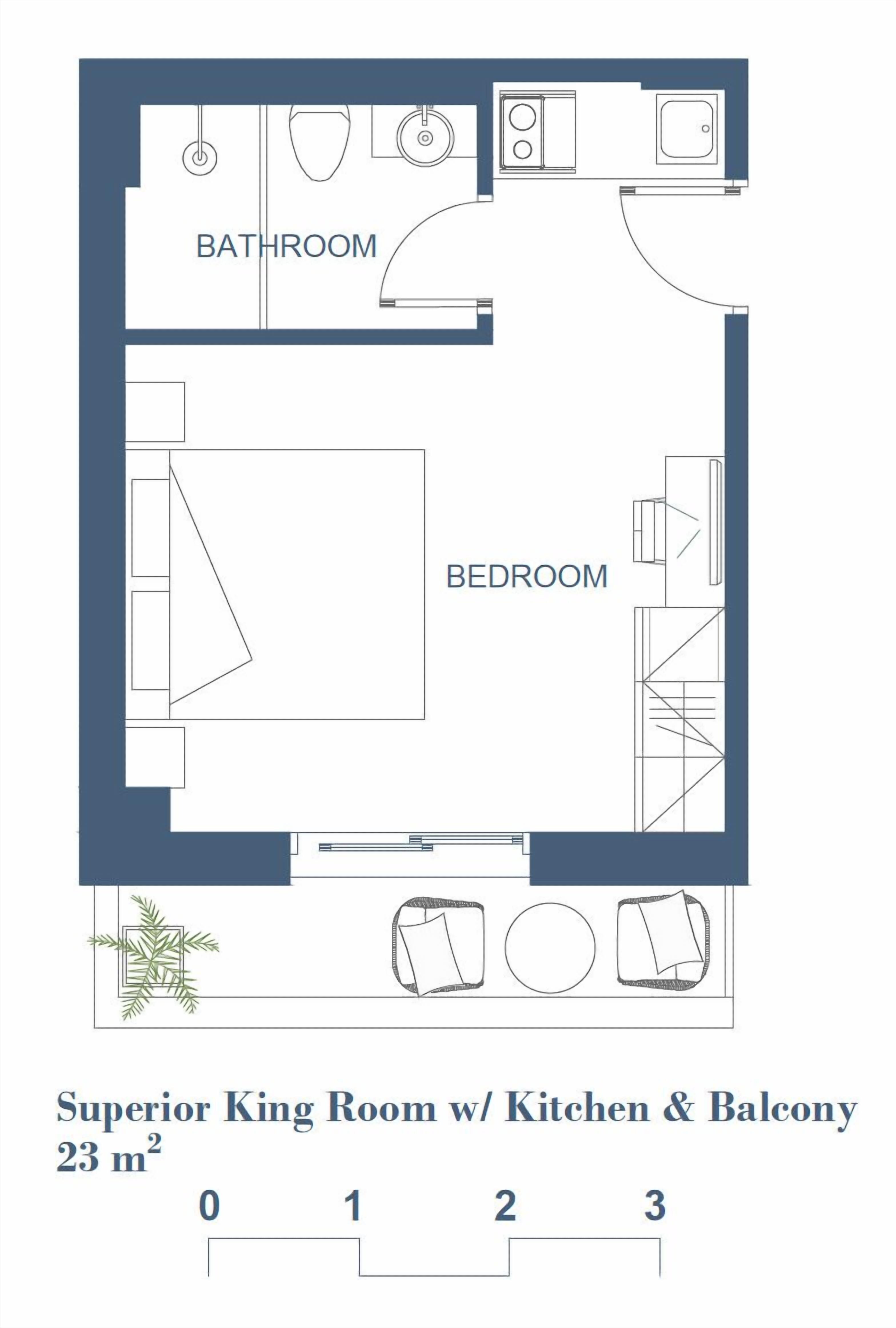 Plan d’étage d’une chambre supérieure avec un grand lit et une cuisine, ainsi qu’un balcon, pour une superficie totale de 23 m².