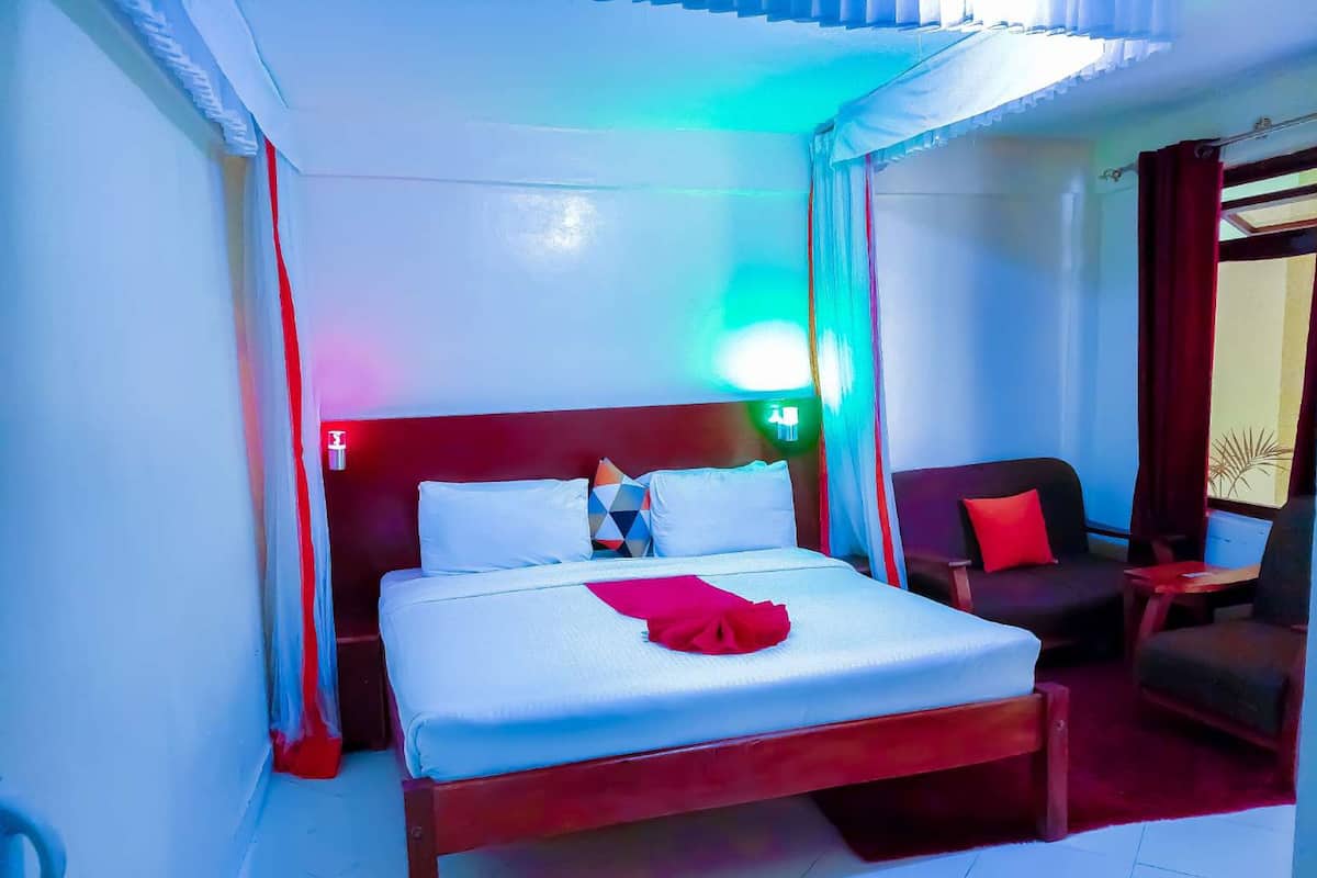 Deluxe Room, Balcony, Garden View | In-room safe, desk, laptop workspace, soundproofing