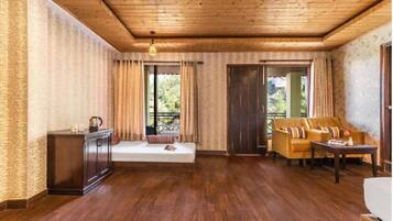 Executive Room | Living area | 55-inch TV with digital channels