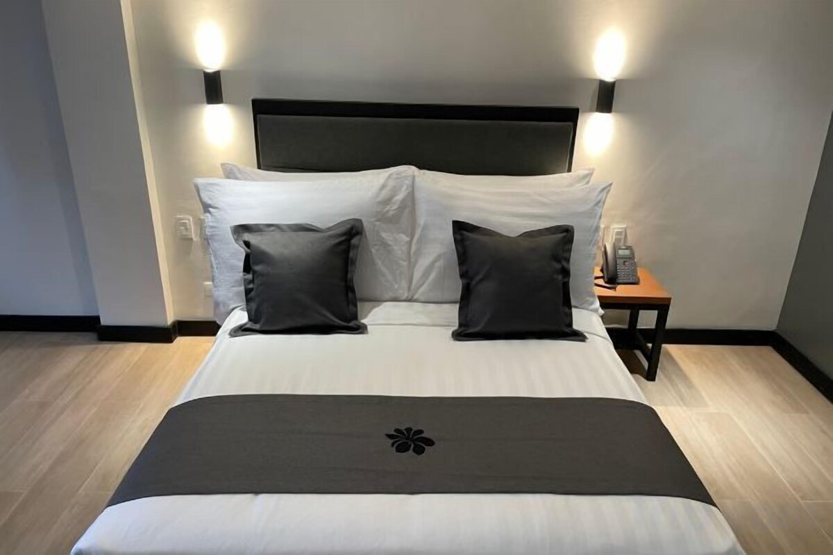 Desk, laptop workspace, free WiFi, bed sheets