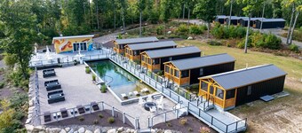 LARGE RESORT WITH 12 PROPERTIES.  NATURAL POND FOR SWIMMING. CAFE ON SITE.
