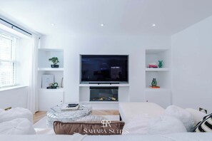 1 habitación, tabla de planchar con plancha, cuna de viaje y wifi