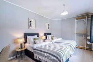 4 habitaciones, tabla de planchar con plancha, cuna de viaje y wifi 