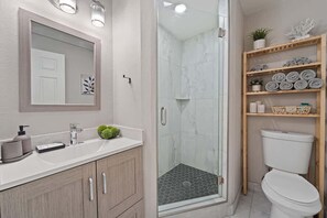 Shower, hair dryer, shampoo