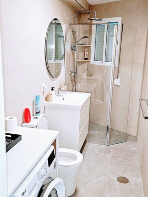 Shower, hair dryer, towels, soap