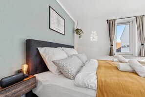 1 habitación, tabla de planchar con plancha, wifi gratis y ropa de cama 