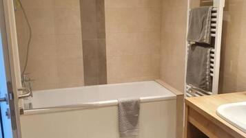 Hair dryer, towels, soap, shampoo