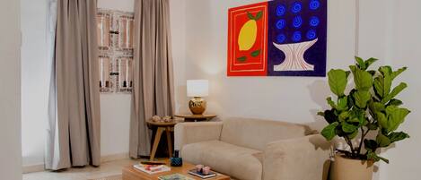 Departamento Confort, 2 habitaciones, vista a la ciudad | Área de sala de estar