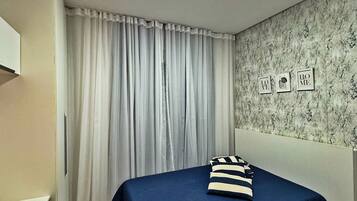 2 quartos, ferros/tábuas de passar roupa, Wi-Fi, roupa de cama