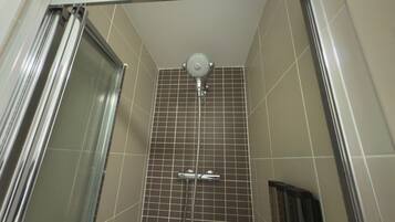 Apartment | Bathroom | Combined shower/tub, deep soaking tub, hair dryer, towels