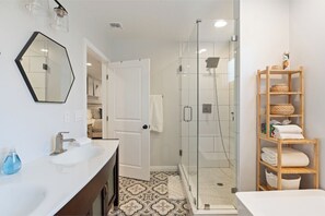 Shower, hair dryer, towels, soap