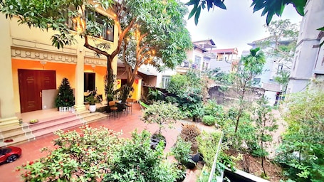 Standard Double Room, 1 King Bed, Garden View | Laptop workspace, soundproofing, iron/ironing board, free WiFi