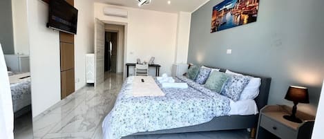 2 slaapkamers, een bureau, een strijkplank/strijkijzer, gratis wifi