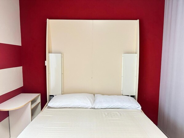 1 chambre, fer et planche à repasser, accès au Wi-Fi (inclus)