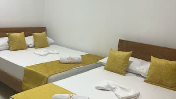 Basic Twin Room | Laptop workspace, blackout drapes, iron/ironing board, free WiFi