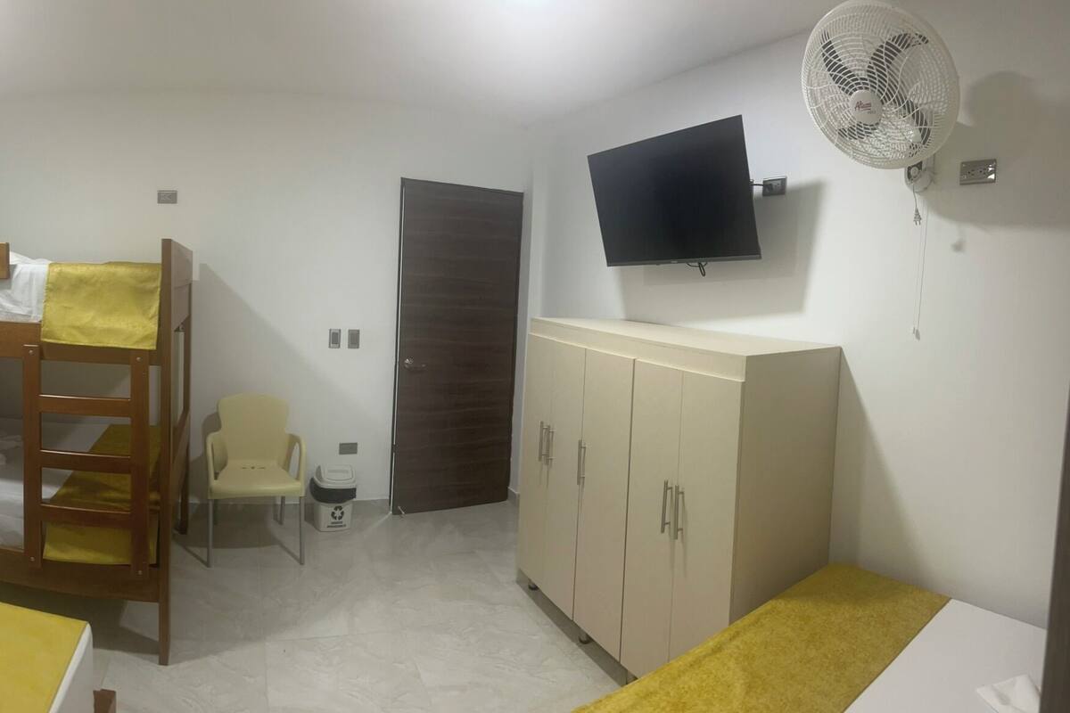 Basic Quadruple Room | Laptop workspace, blackout drapes, iron/ironing board (on request)