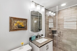 Shower, hair dryer, towels, soap