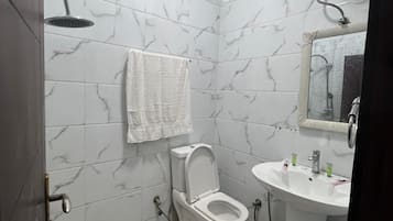 Shower, towels, soap, shampoo