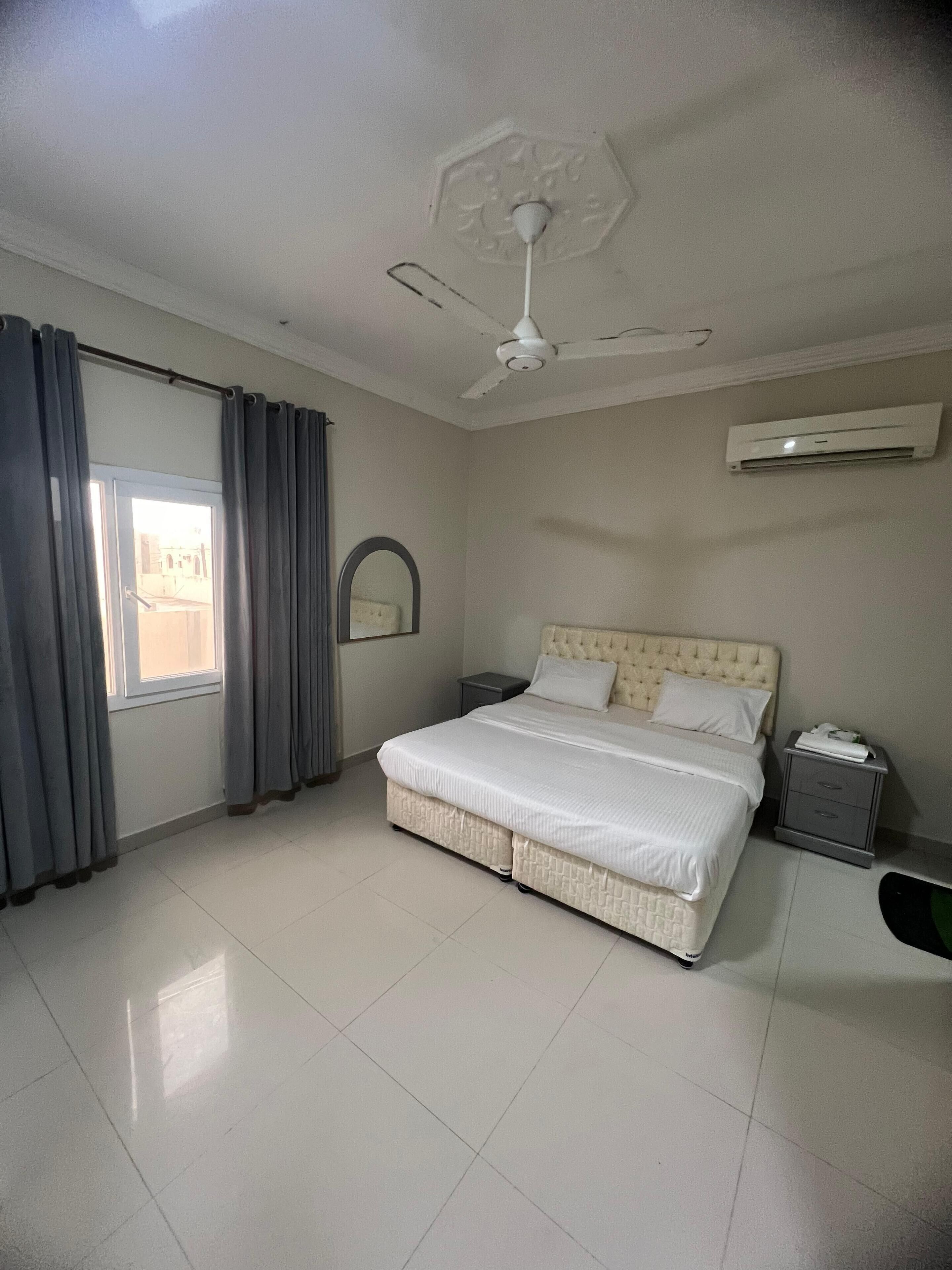 ファミリー アパートメント | 高級寝具、ピロートップベッド、WiFi (無料)、ベッドシーツ