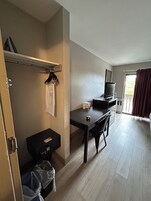 Standard Single Room, 1 Queen Bed | Desk, laptop workspace, blackout drapes, iron/ironing board