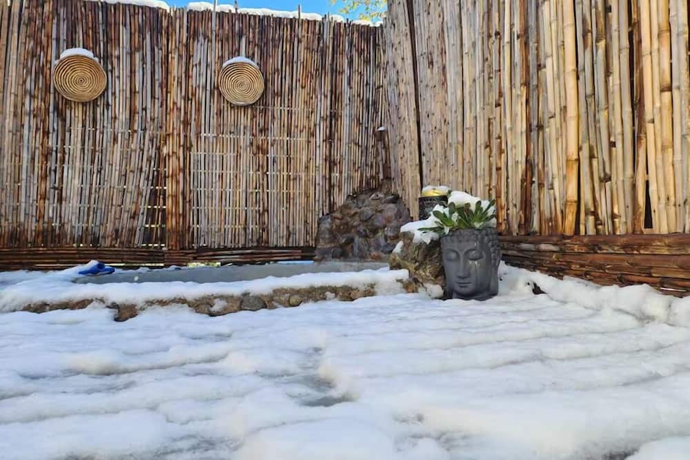 Cabaña con jacuzzi exterior