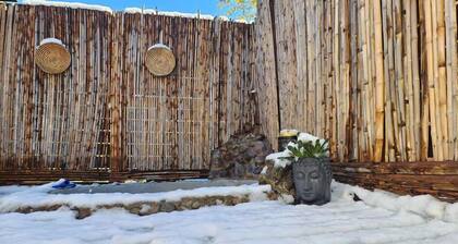 Cabaña con jacuzzi exterior