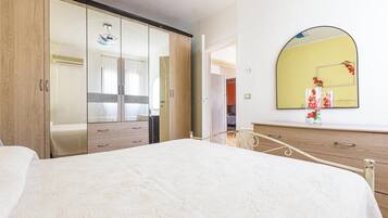 2 quartos, ferros/tábuas de passar roupa