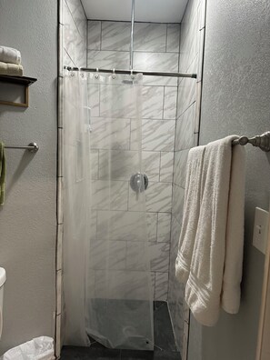 Hair dryer, towels, soap, toilet paper