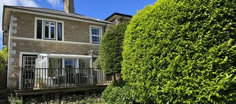 Adjoining stone dog-friendly cottages with garden, parking and games rooms