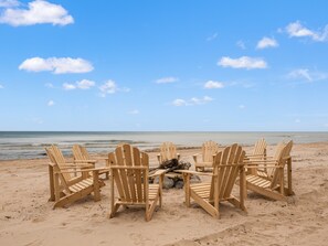 On the beach, sun-loungers, beach towels