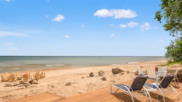 On the beach, sun loungers, beach towels