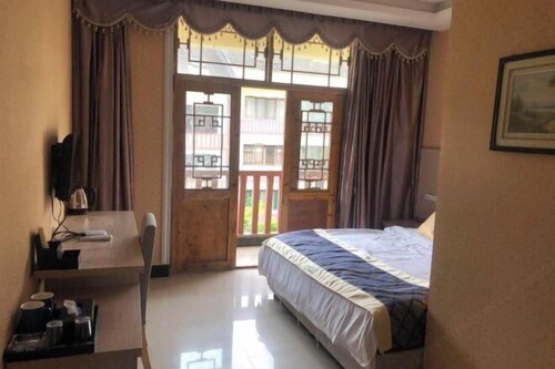 Shizhu Saiqike Hotel