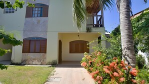 A two-story building with a stone facade, a wooden door, and a small window. - Porto D Aldeia - Cabo Frio RJ - 1 (Sao Pedro da Aldeia)
