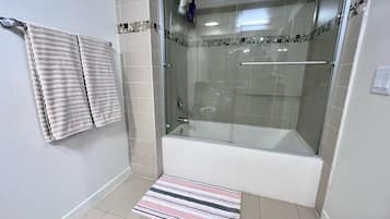 Shower, hair dryer, towels, soap