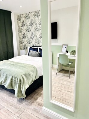 1 bedroom, desk, iron/ironing board, travel cot