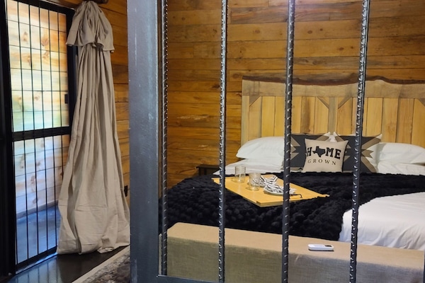 Rustic Trails - the Jail cabin's bedroom seen from the Living Room