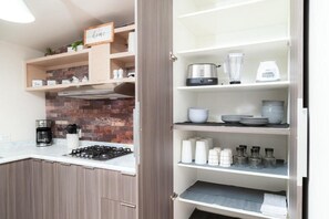 Familie huis | Privékeuken | Een koelkast, een microgolfoven, een oven, een vaatwasser