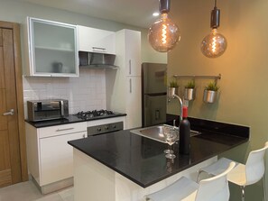 Microwave, coffee/tea maker, toaster, blender - Centrally located apartment|Infinity pool with sea and city view|Gym|bbq|WF (Santo Domingo)