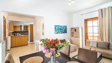 Standard Apartment | Living room | 32-inch Smart TV with digital channels