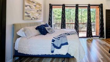 Cabin, Multiple Beds, Hot Tub, Garden View (Sugar Bear Den) | 1 bedroom, individually decorated, individually furnished, bed sheets