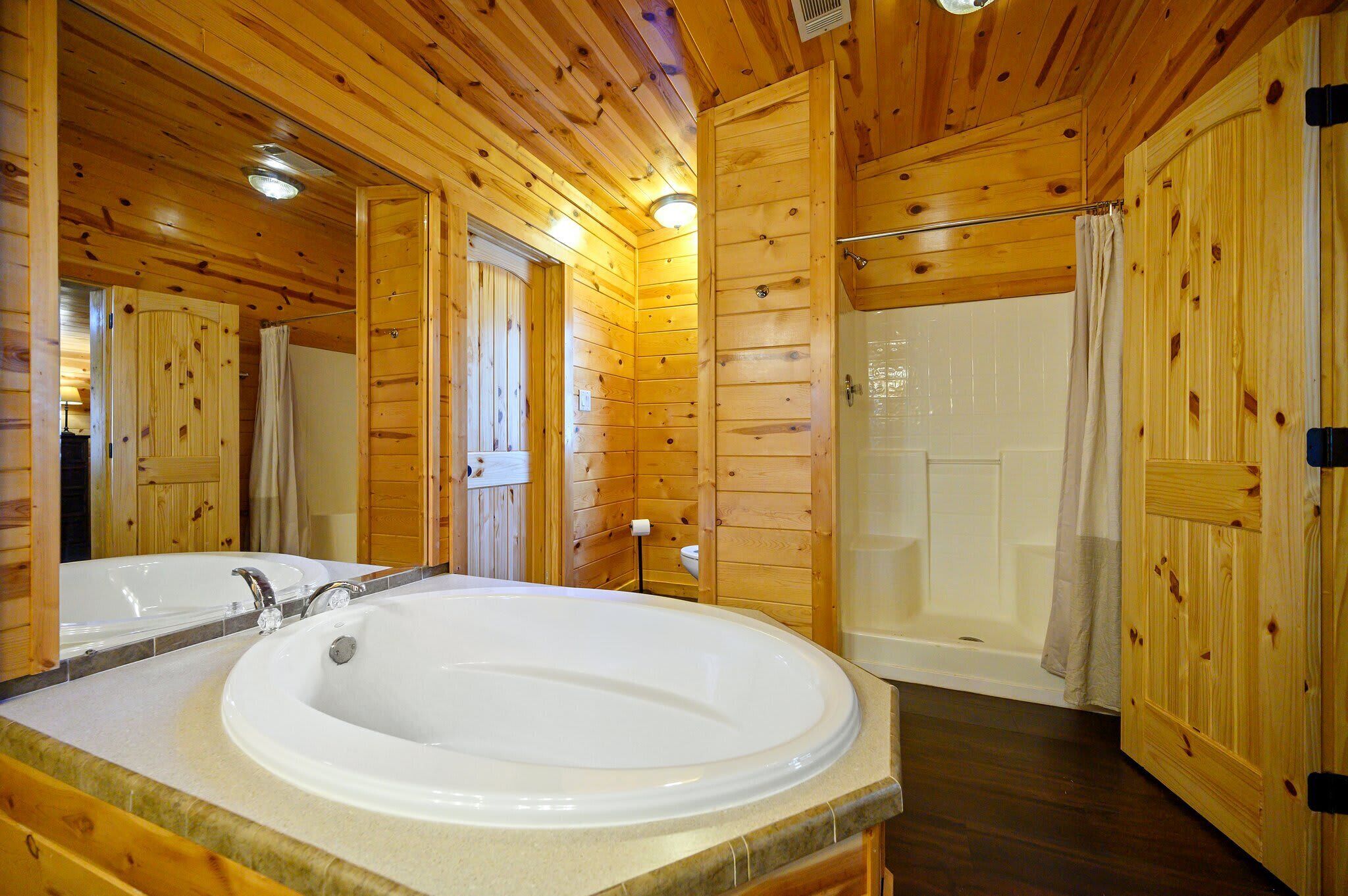 Cabin, Multiple Beds, Hot Tub, Mountain View (Outlaw Rose) | Bathroom | Deep-soaking bathtub, hair dryer, towels
