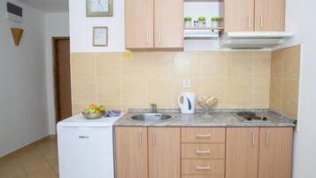 Apartment (One Bedroom Apartment with Sea View 1) | Private kitchen | Fridge